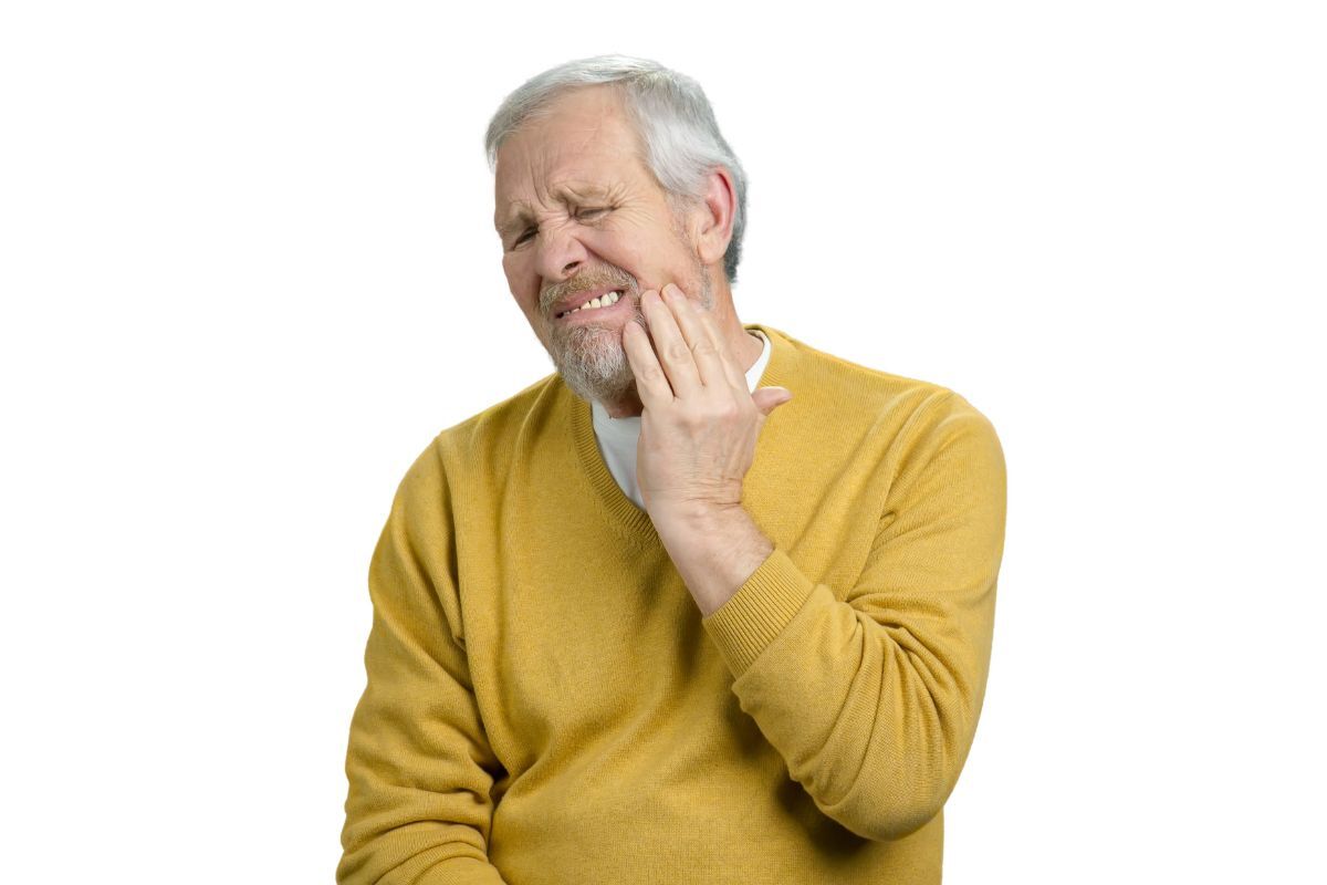 Patient learning about dental implant after tooth loss during a consultation in Jacksonville, NC.