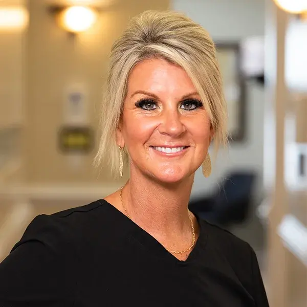 img-tricia-marshburn Professional female dental team member smiling in Jacksonville dental office.