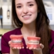 Woman comparing traditional braces with orthodontic treatment options in Jacksonville, NC